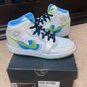 Rare Air Jordan 1 Mid SE “Warped Swoosh” kicks!